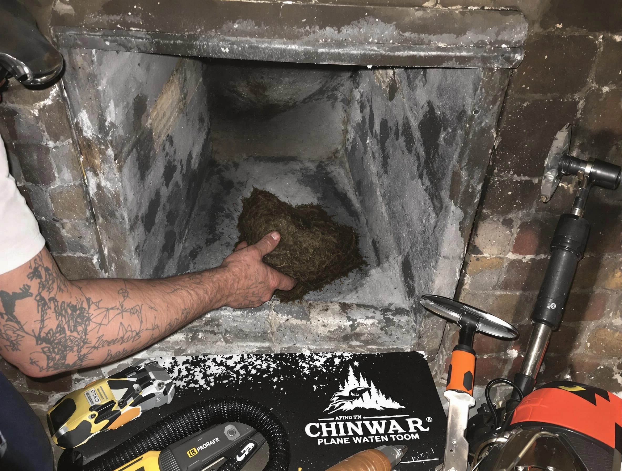 Salem Chimney Sweep safely removing debris and screening chimney in Salem, MA