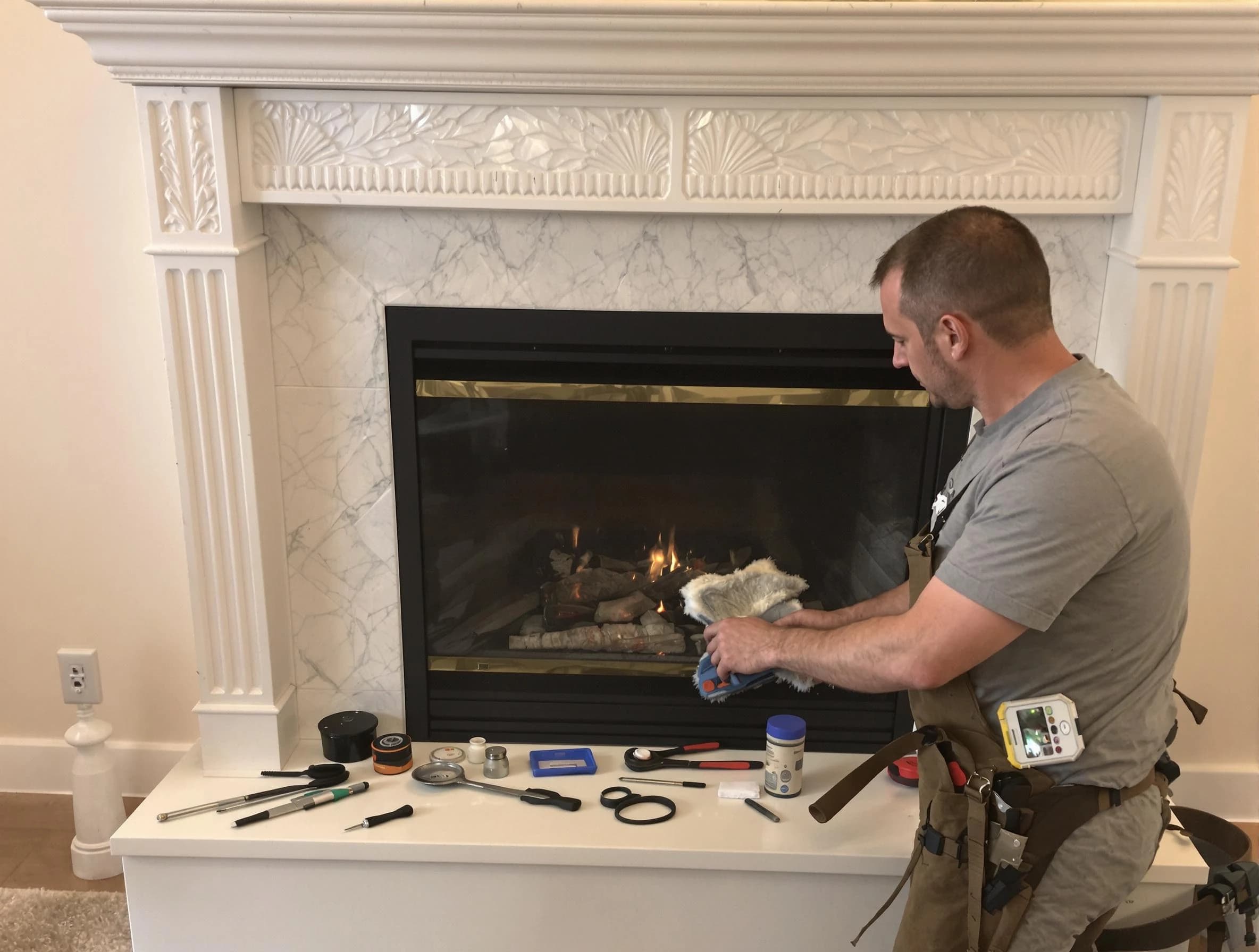 Salem Chimney Sweep performing fireplace maintenance in Salem, MA